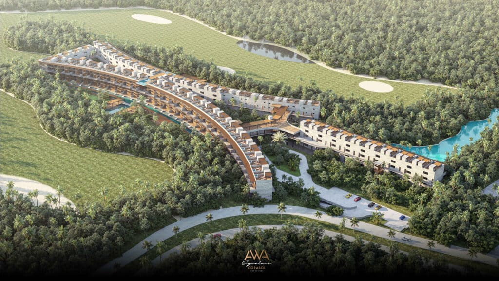 Aerial view of AWA Corasol PH D in Playa del Carmen, showing a modern, curved residential building surrounded by lush greenery, water features, and golf course.