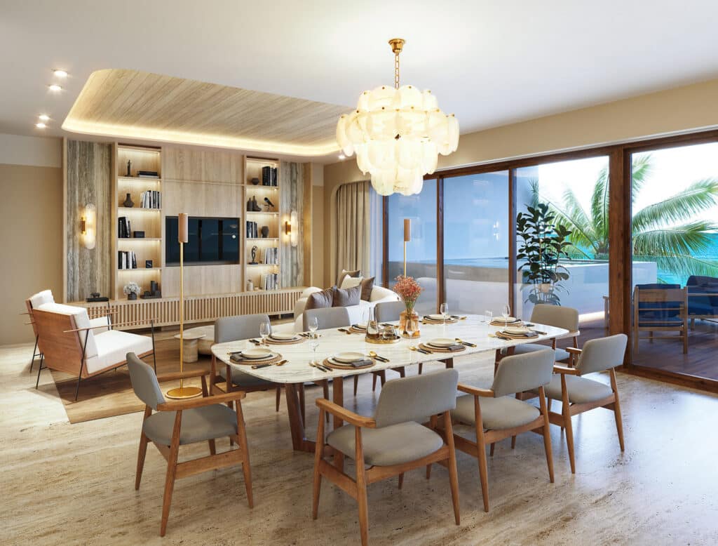 Interior view of Saint Marine 305 in Playa del Carmen, featuring a spacious living and dining area with large windows overlooking the beachfront and surrounding palm trees.