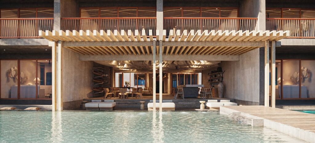 Maranta 203 Beachfront in Tulum features a contemporary design with a pool and shaded lounging area overlooking the ocean.