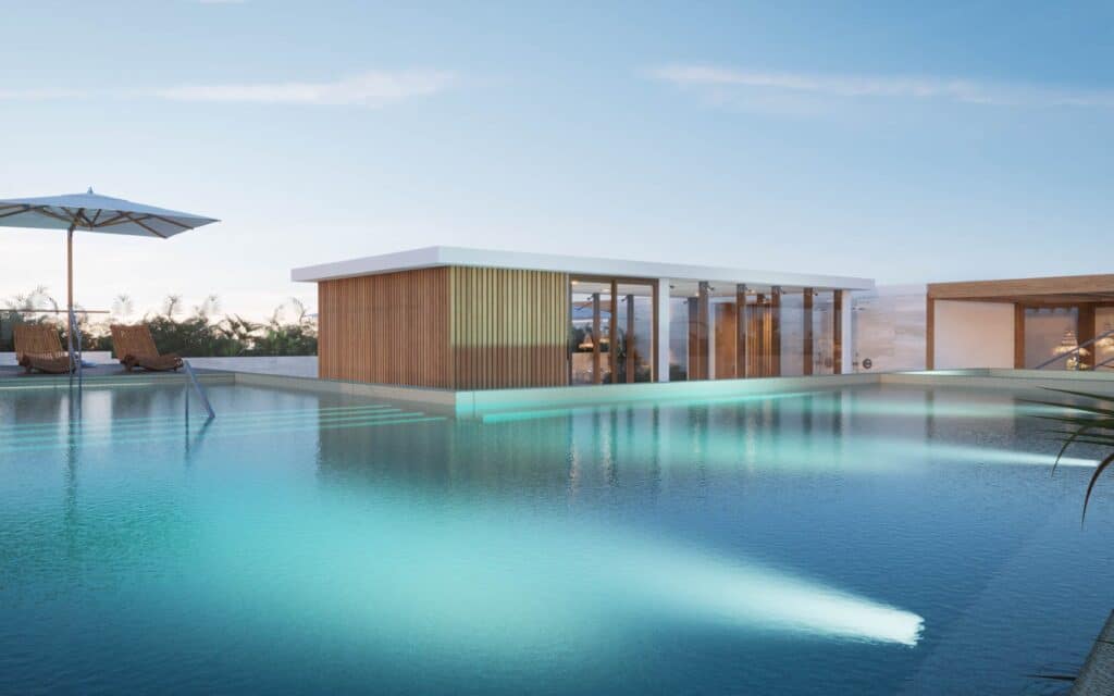 Distrito Zen Cancun 407 pool area with modern cabana and lounge chairs in Puerto