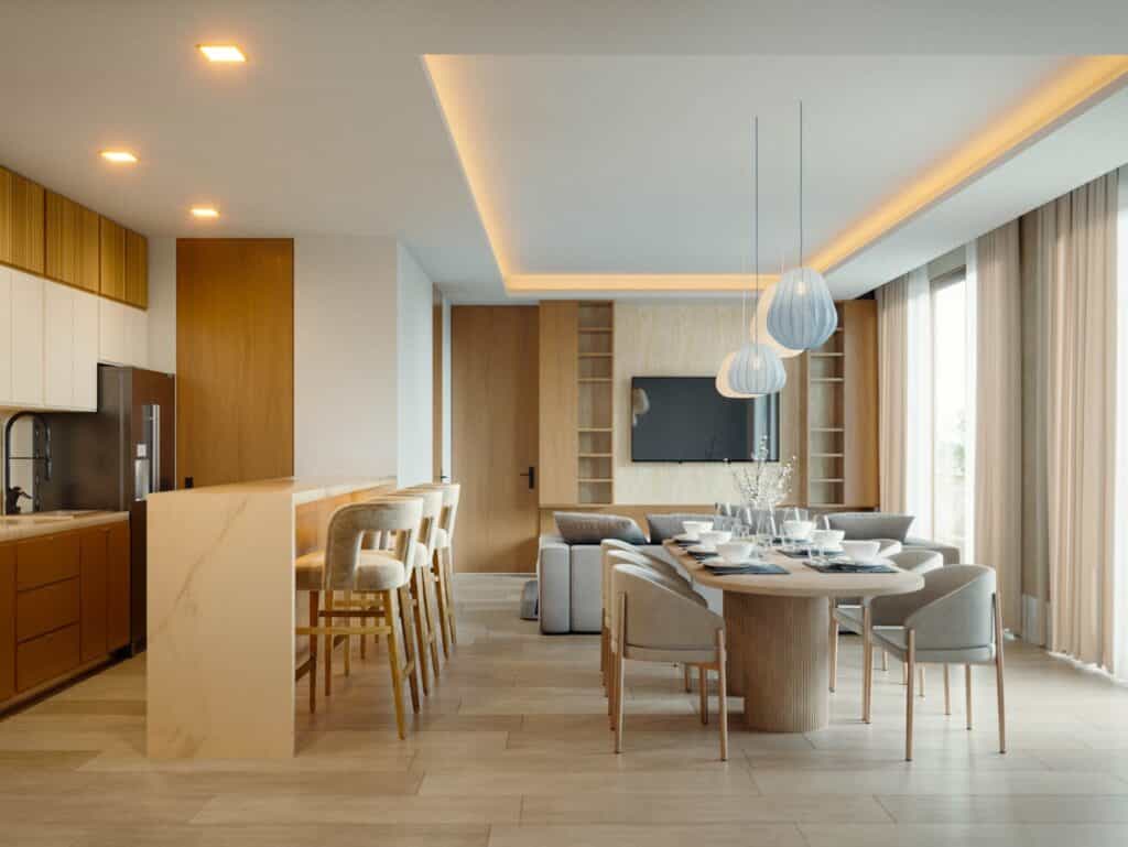 Interior of Distrito Zen Cancun 407 in Puerto Cancun, featuring a modern open-plan kitchen and dining area with neutral tones