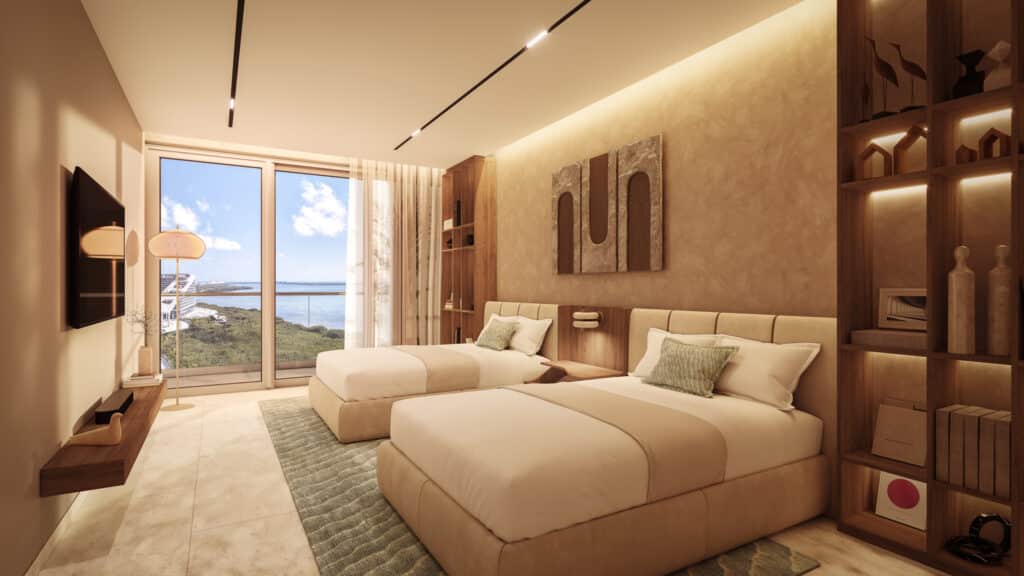 A modern bedroom in Bay View Grand 1401-B, Cancun, with two plush beds, a large window offering ocean views, warm wooden accents, and minimalist decor.