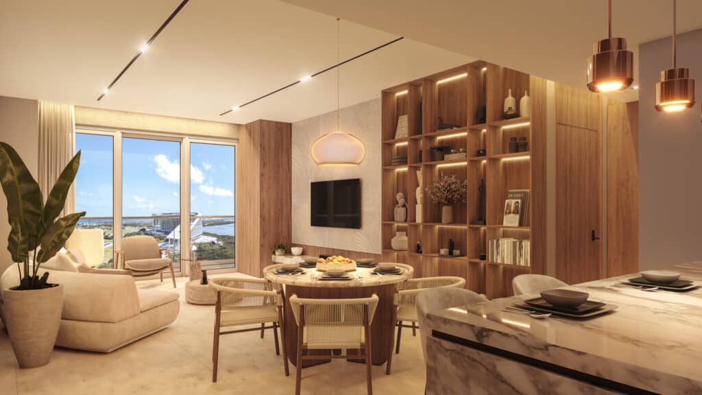 Living room in Bay View Grand 1401-B, Cancun's Grand Island area, featuring a modern design with a large window view, wooden shelving, and stylish lighting fixtures.