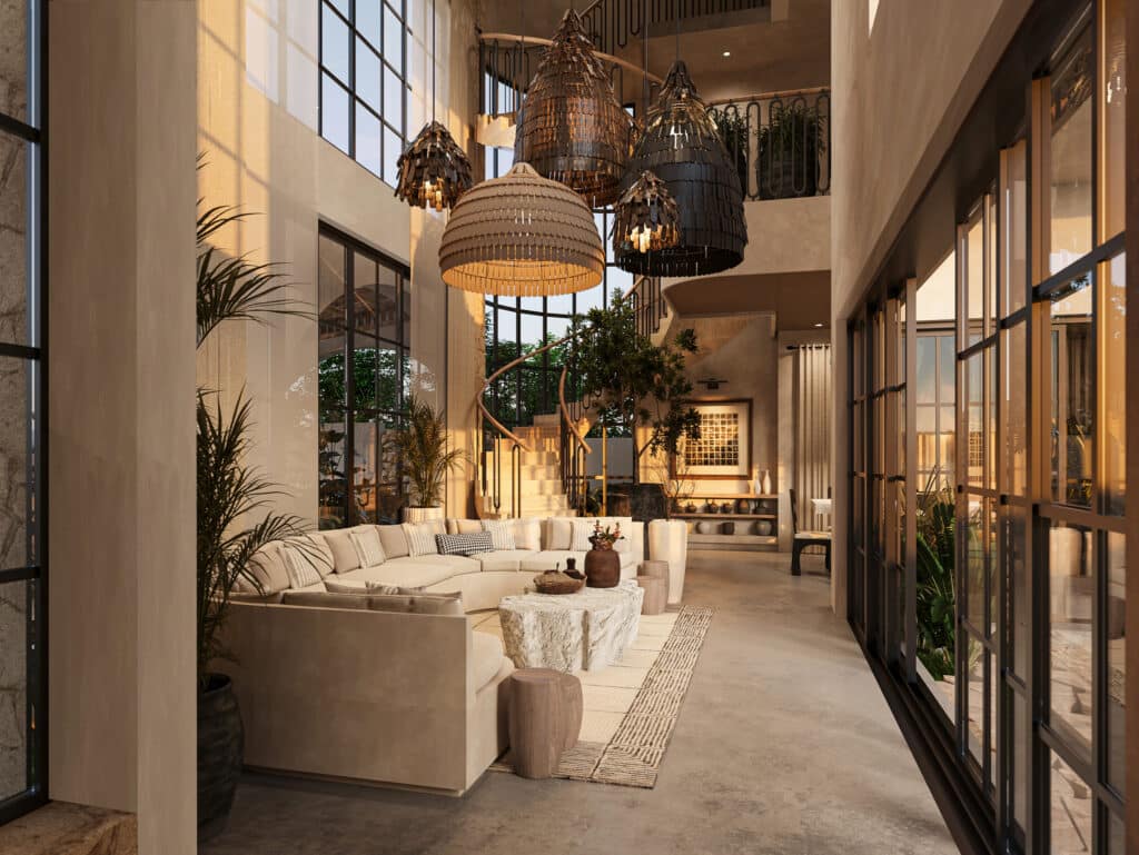 Interior of a modern home at Satori Enzo Horizon in Tulum, featuring high ceilings, large windows, eclectic hanging lights, and stylish decor with lush plants.