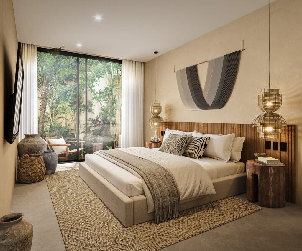 A modern bedroom in Satori Korin, Tulum, featuring a large bed with neutral bedding, wooden side tables, hanging lamps, and a glass door opening to a lush garden area.
