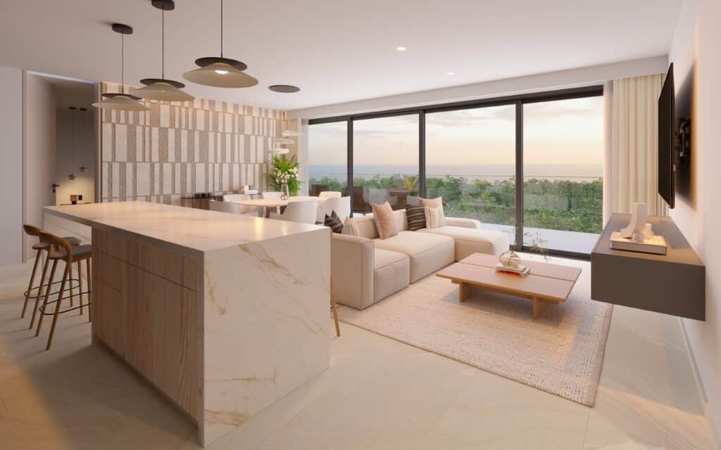 Modern open-concept living room with a white sectional sofa, wooden coffee table, and floor-to-ceiling windows overlooking Playa del Carmen.