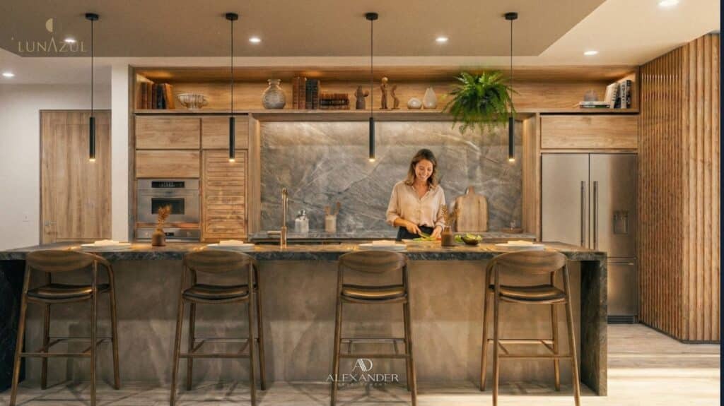 Modern kitchen with wood and stone accents, a woman preparing food at Luna Azul 101 in Bahia Xcacel, Puerto Aventuras.