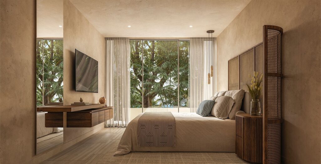 Bedroom with large floor-to-ceiling windows and tropical foliage view, neutral decor, wooden furniture, and textured walls at Viceroy Residences in Playa del Carmen.